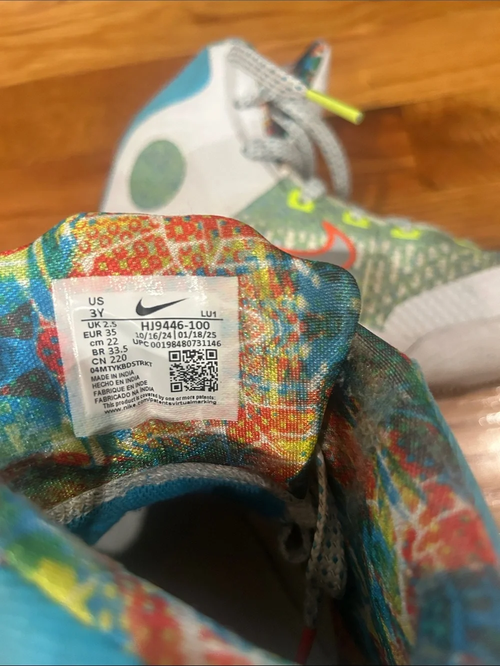 Nike Kids Multicolor High-Top Sneakers with Orange & Teal Accents